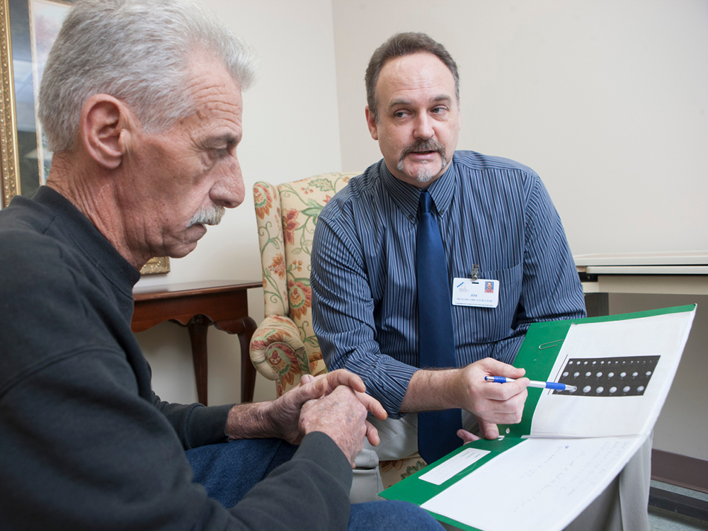 carousel image of patient being counseled